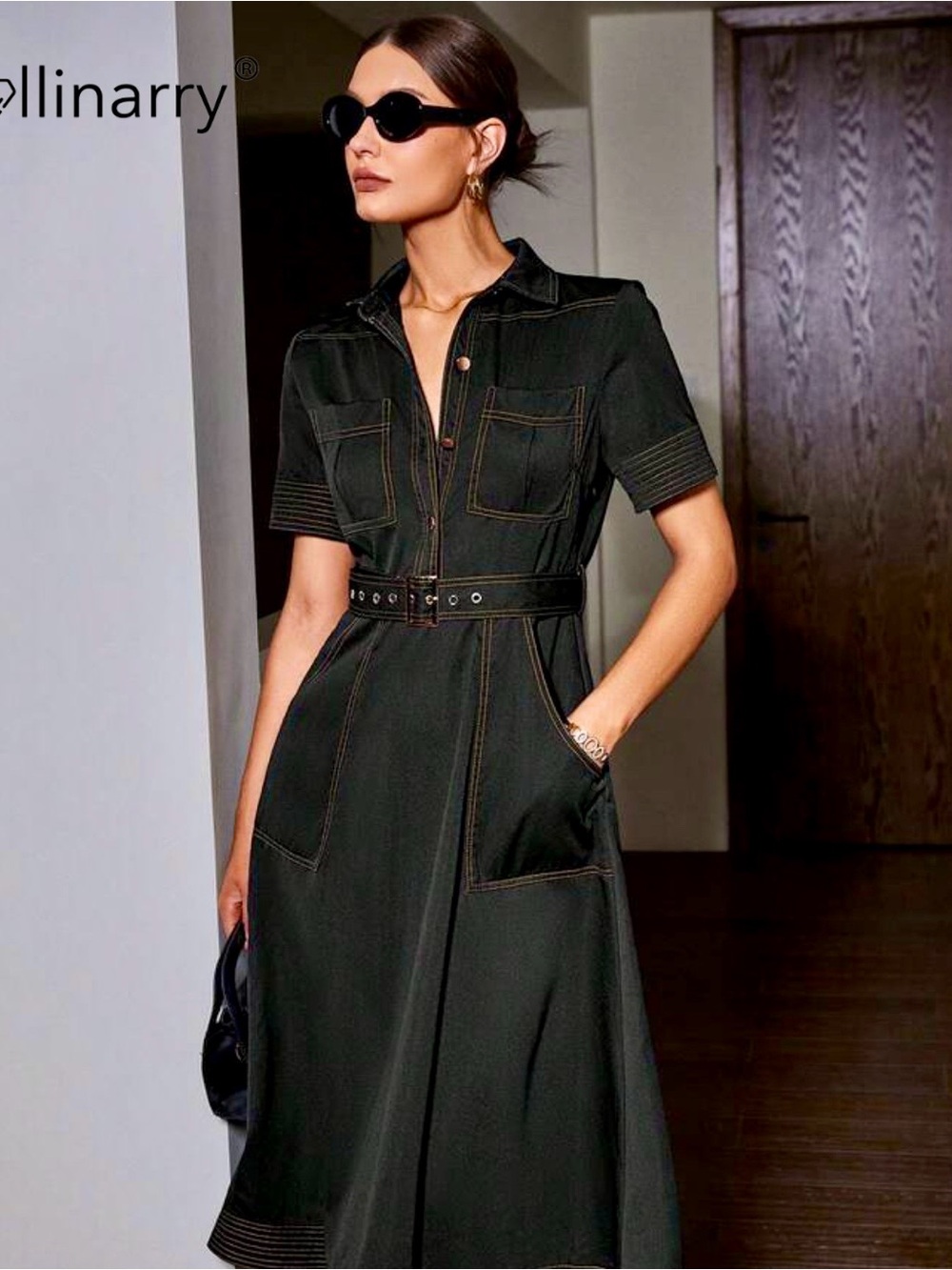 Black buttoned and Belted Utility Dress with top stitching.